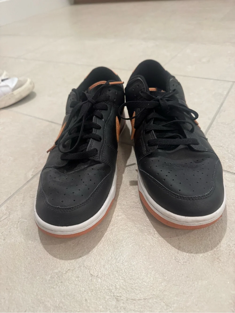 Nike Men’s Low-Top Dunks Sneaker - Black with amber Copper Swoosh